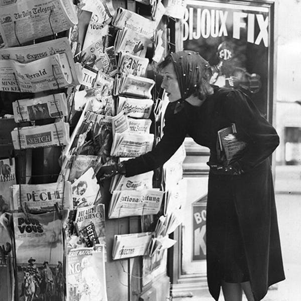 black & white;format portrait;female;publication;newspaper;poster;french;europe;m 147300 no neg person human newsstand shop text