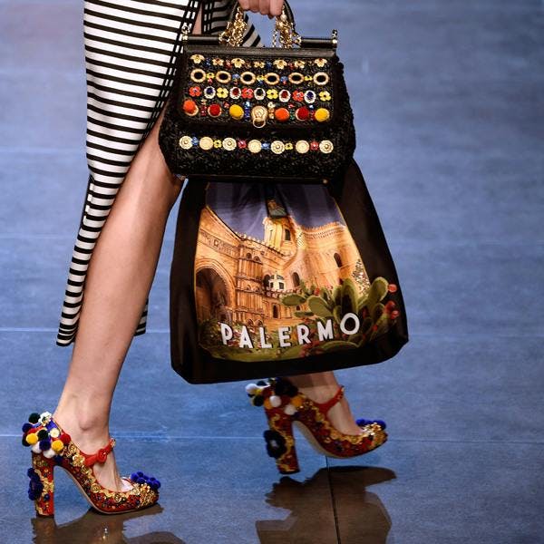 milan handbag bag accessories accessory person human clothing apparel purse