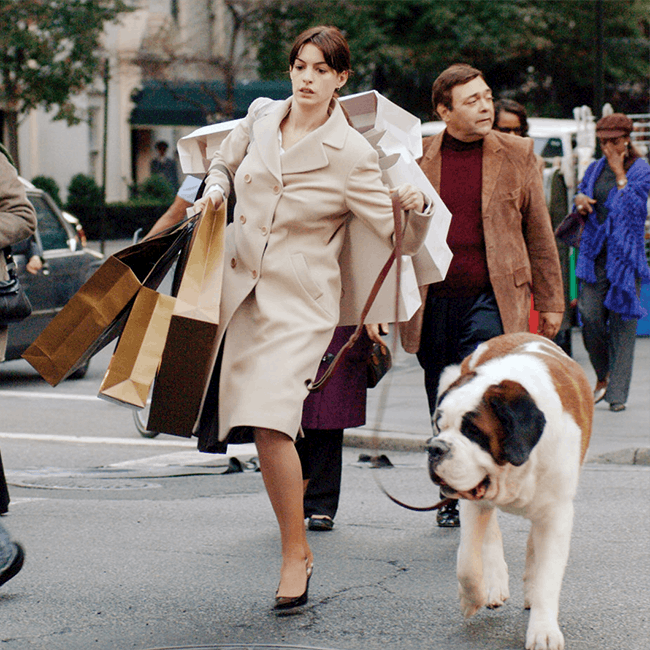 person human coat clothing dog mammal animal canine pet pedestrian