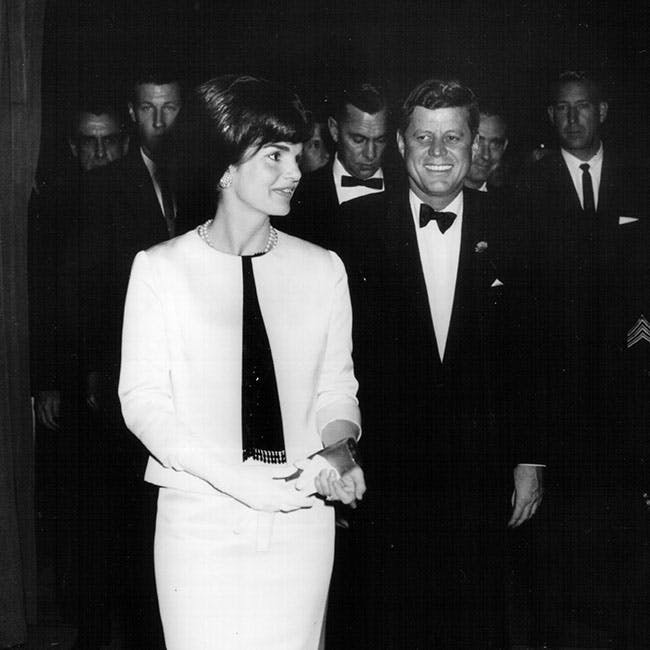 jfk jacqueline politician ball black and white photography black tie couple event fashion first lady formal full length gala historic history political politics presidential tuxedo archival washington dc tie accessories accessory clothing apparel person human suit coat overcoat