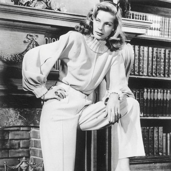 black & white;format portrait;female;film;film actress;fashion clothing;personality;american;key 514660;key/p/bacall/lauren person human clothing apparel furniture indoors