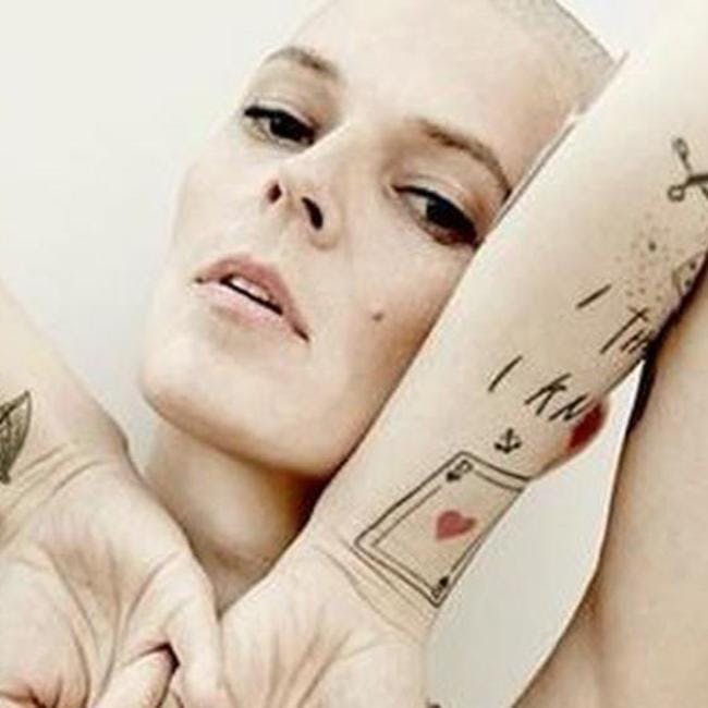 skin arm person human tattoo face