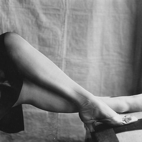 black & white;format portrait;leg;foot;fashion clothing;m 143981 no neg;m/clo/1930-39/foot/slippers clothing apparel shoe footwear high heel person human heel