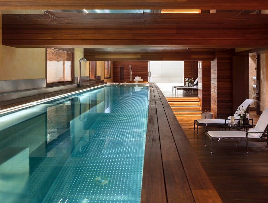 pool water swimming pool indoors interior design floor flooring architecture building wood